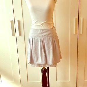 Light khaki colored short chiffon skirt from Gap